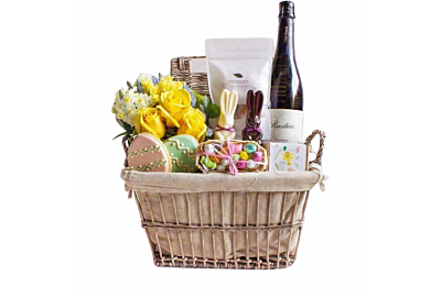 Luxury Easter gift basket in Denver with fresh yellow roses, gourmet chocolates, and seasonal treats